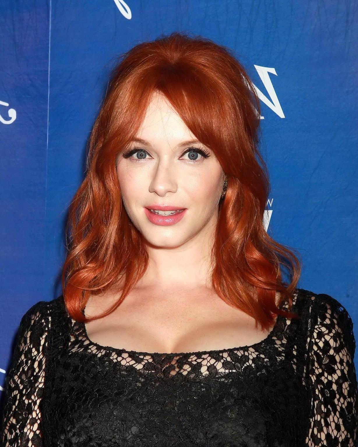 10P Christina Hendricks shows cleavage wearing a black lace dress at Variety Pre-EMM