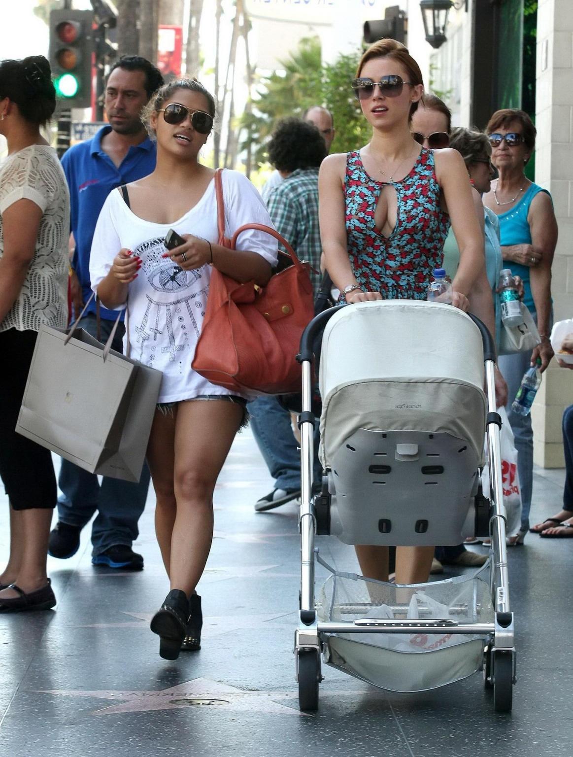 10P Una Healy shows huge cleavage while shopping in Los Angeles