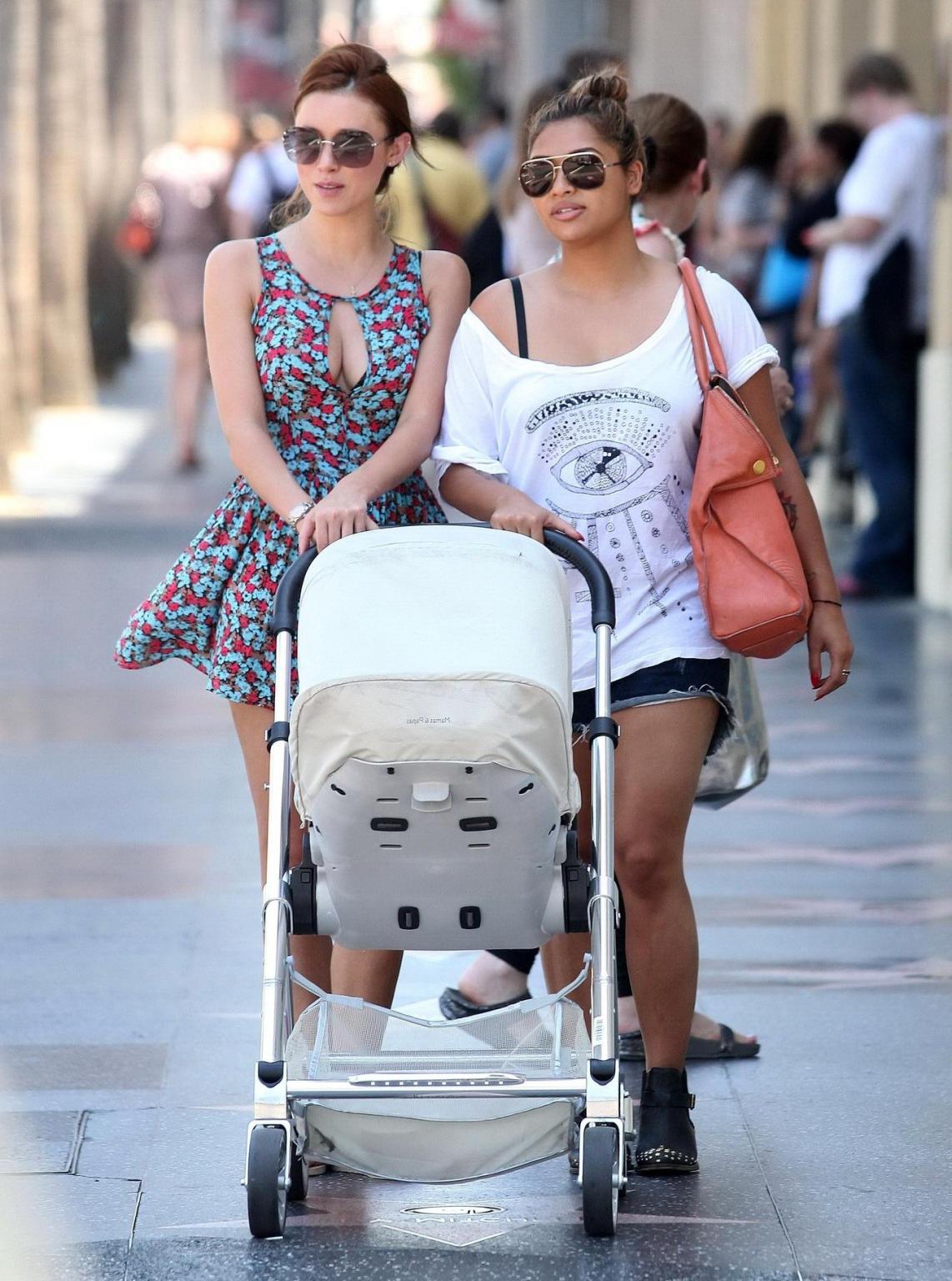 10P Una Healy shows huge cleavage while shopping in Los Angeles