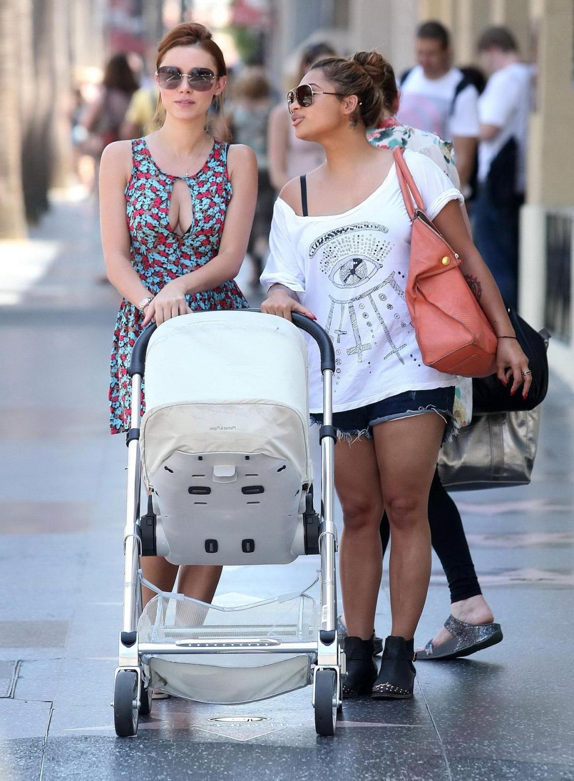10P Una Healy shows huge cleavage while shopping in Los Angeles