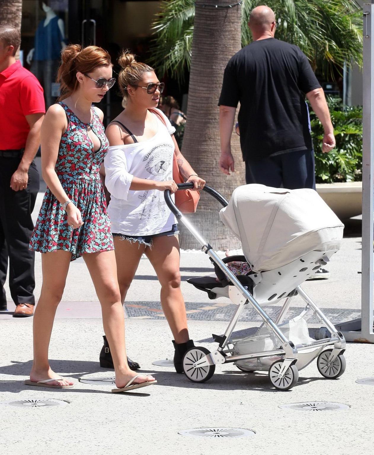 10P Una Healy shows huge cleavage while shopping in Los Angeles