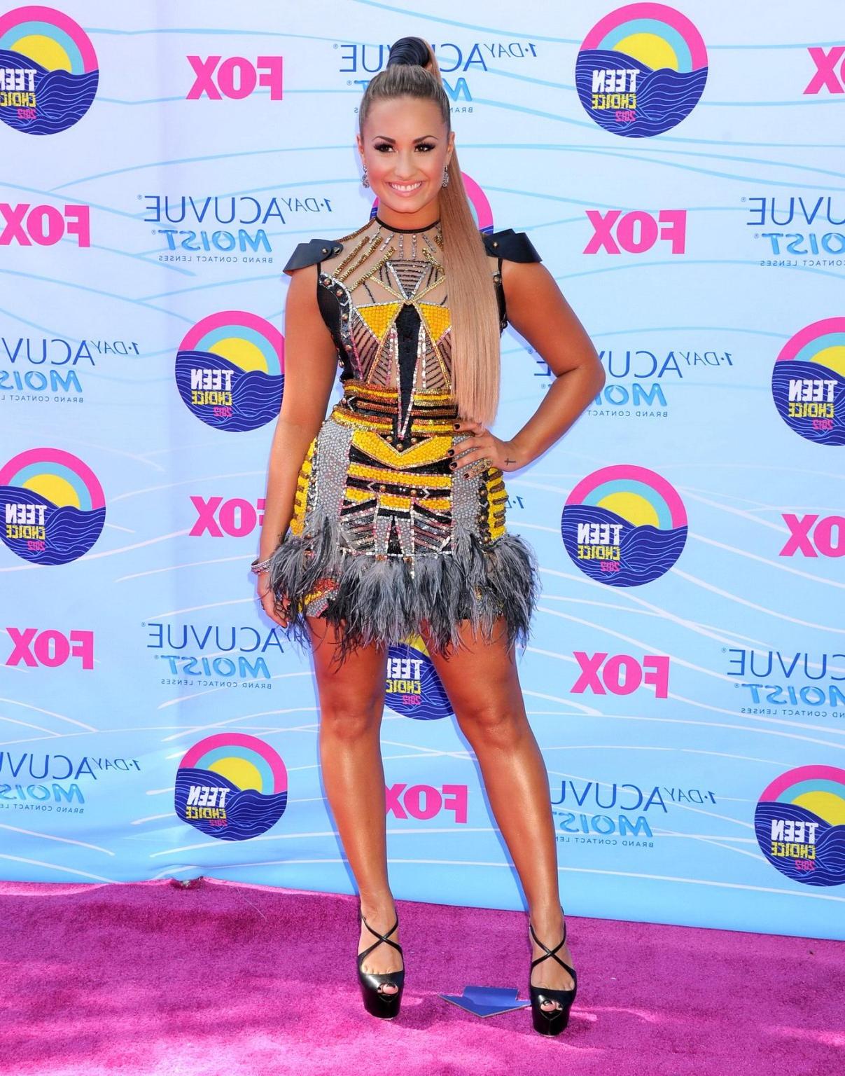 10P Demi Lovato nip slip wearing a partially see through little dress at 2012 Teen C