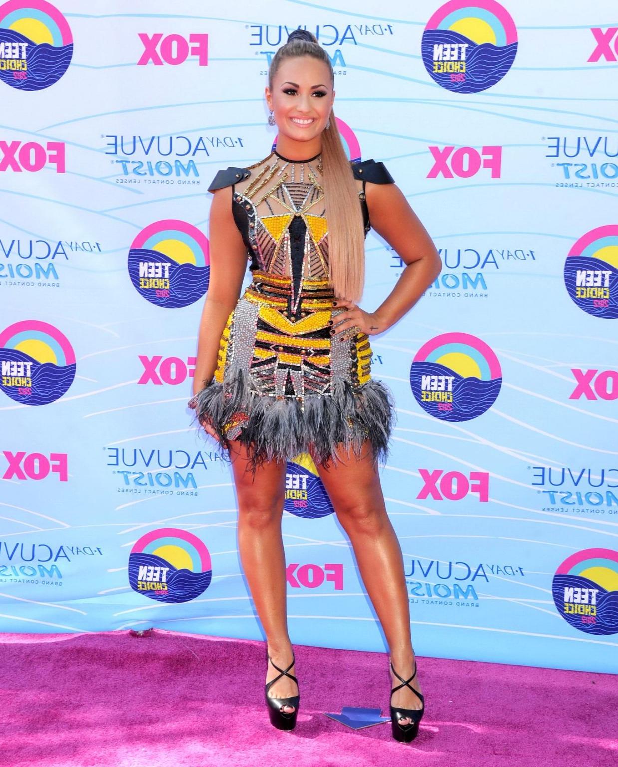 10P Demi Lovato nip slip wearing a partially see through little dress at 2012 Teen C