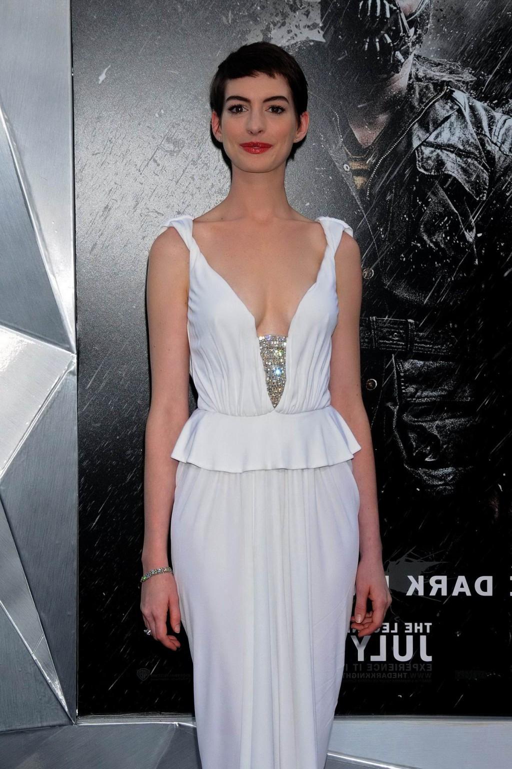 10P Anne Hathaway showing cleavage in white dress at 'Dark Knight Rises' premiere in