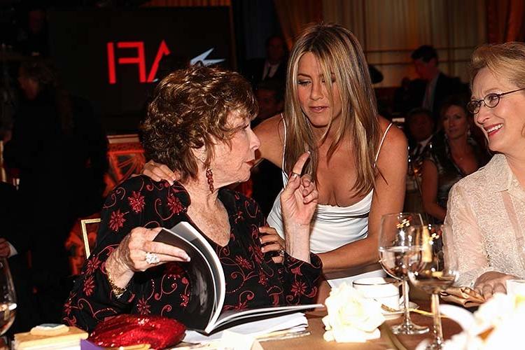 10P Jennifer Aniston exposing her big old maid cleavage on some event