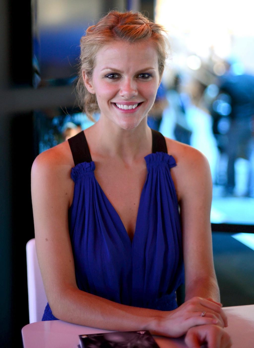 10P Brooklyn Decker showing big cleavage in blue mini dress at PlayStation booth at 