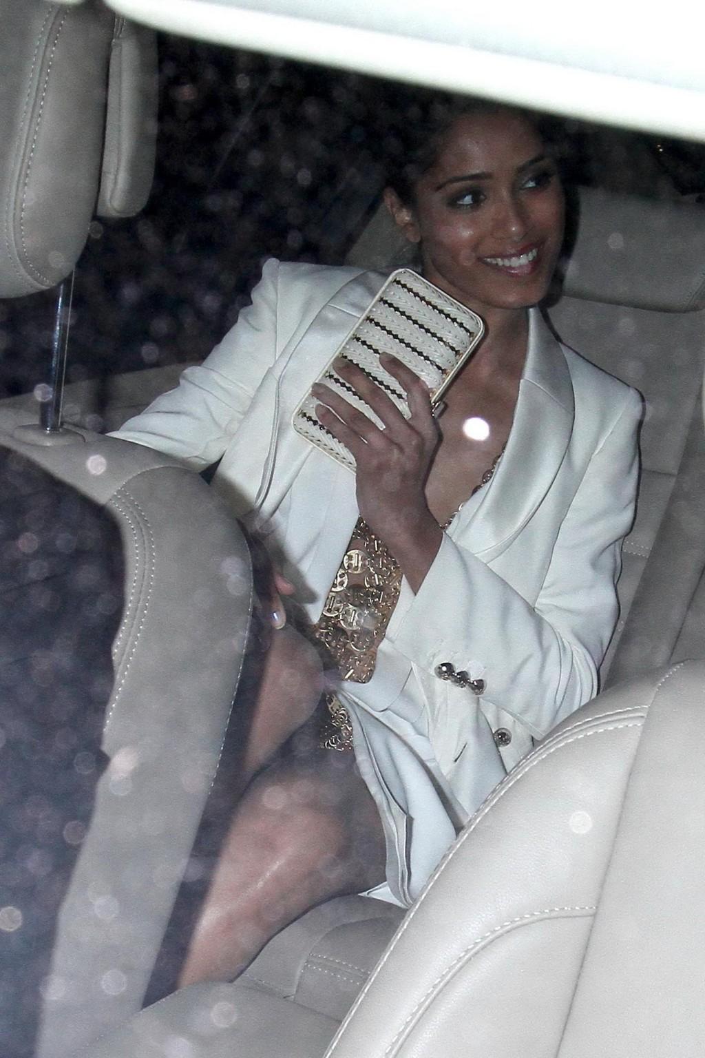 10P Freida Pinto upskirt leaving L'Oreal 15 Anniversary Diner in Cannes