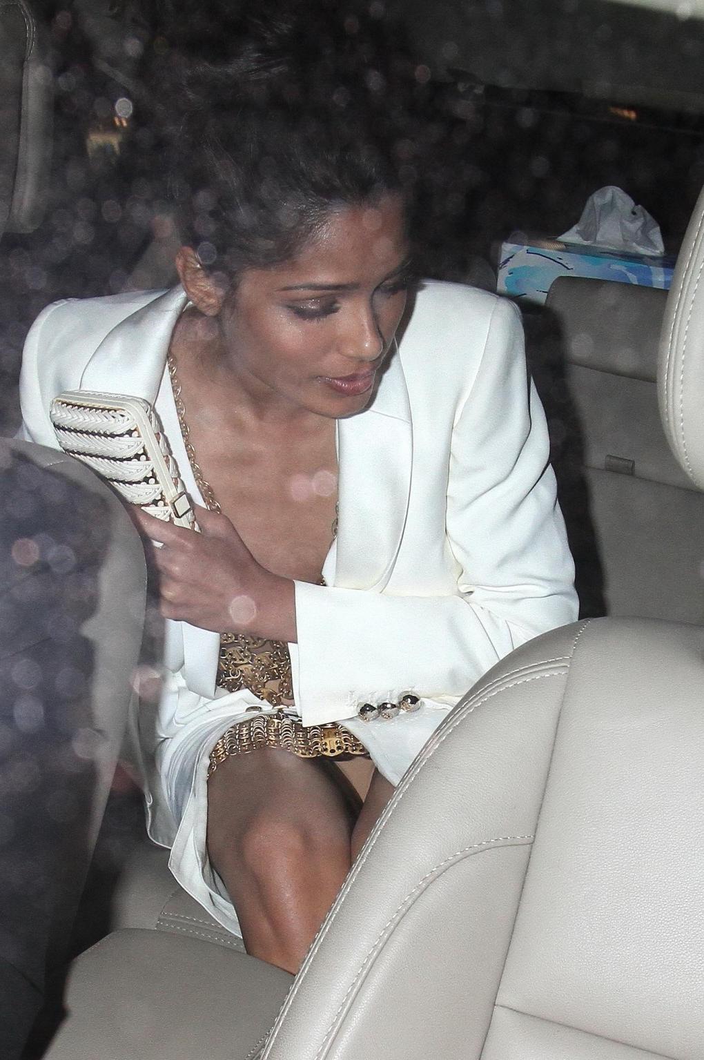 10P Freida Pinto upskirt leaving L'Oreal 15 Anniversary Diner in Cannes