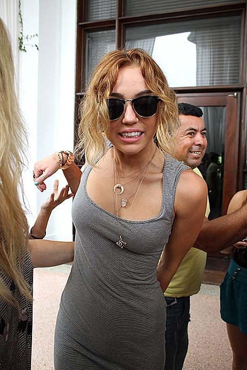 10P Miley Cyrus nipple slip and see thru paparazzi photos