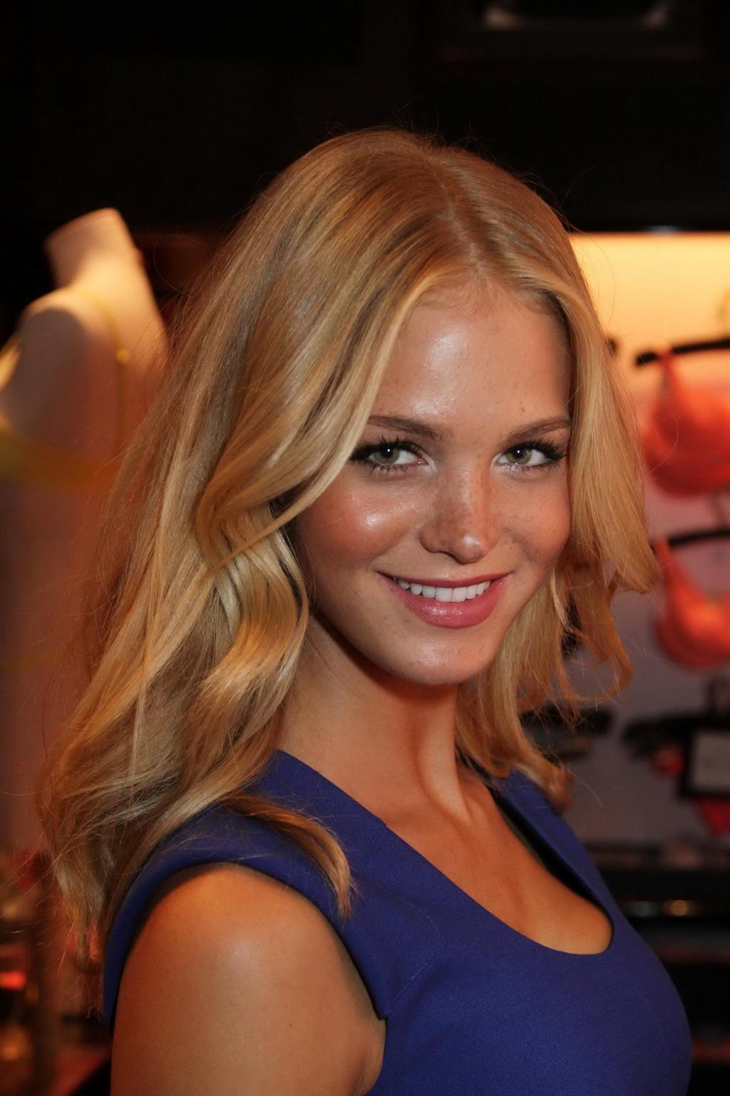 16P Erin Heatherton showing cleavage in short blue dress at VS Very Sexy tour stop i