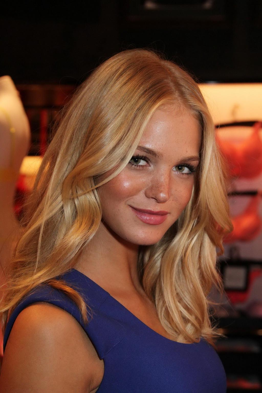 16P Erin Heatherton showing cleavage in short blue dress at VS Very Sexy tour stop i