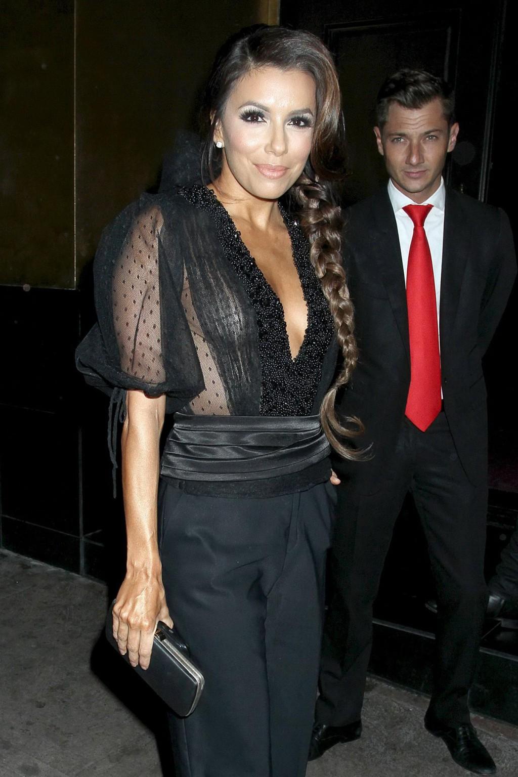 16P Eva Longoria shows cleavage leaving a party at Beso in LA