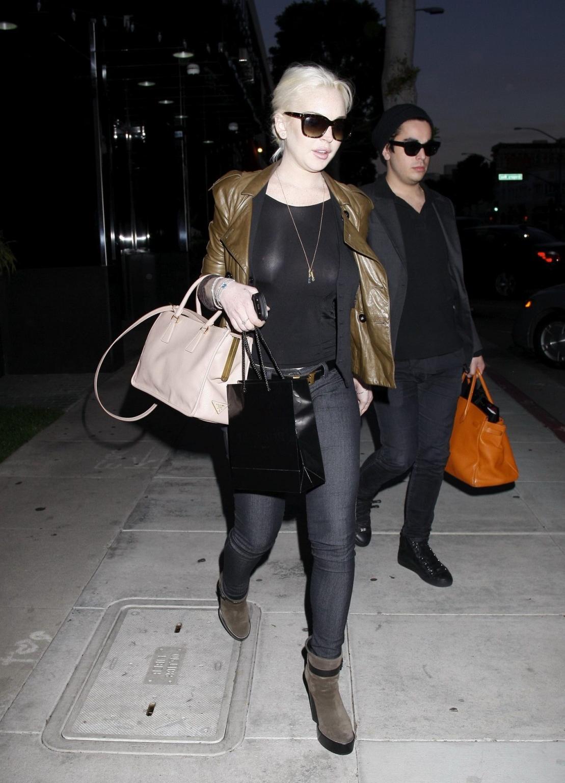 16P Lindsay Lohan braless wearing see through top outside '14 Karat' in LA