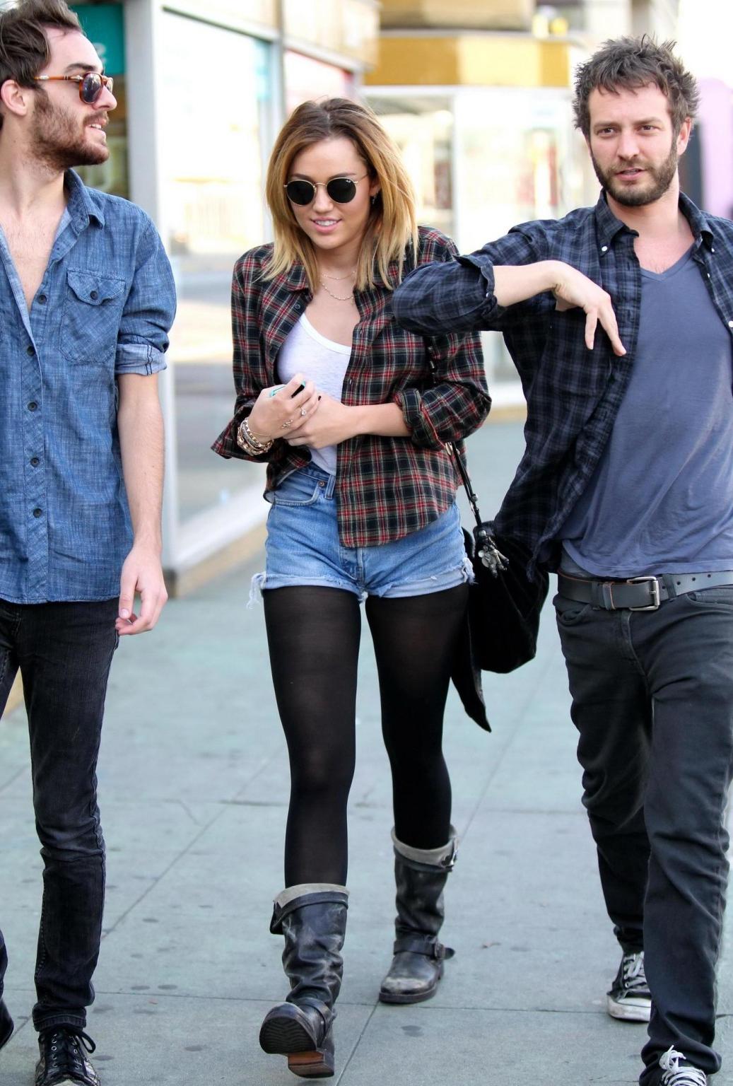 16P Miley Cyrus braless showing pokies outside Wokcano Restaurant in LA