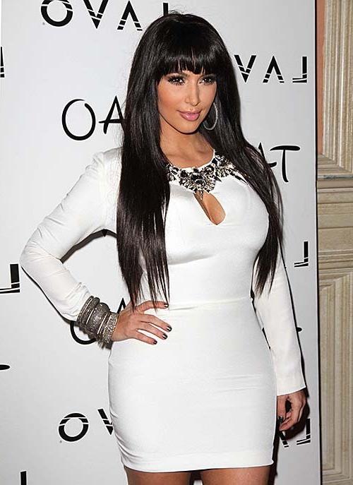 16P Kim Kardashian exposing sexy body and massive cleavage