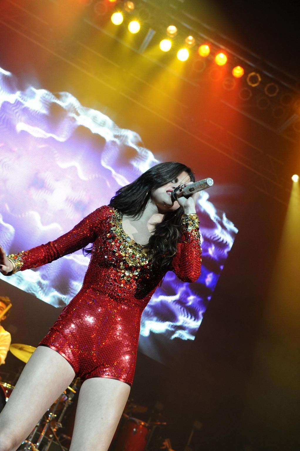 16P Selena Gomez in skimpy red outfit performing at the 99.7 Triple Ho Show in San J