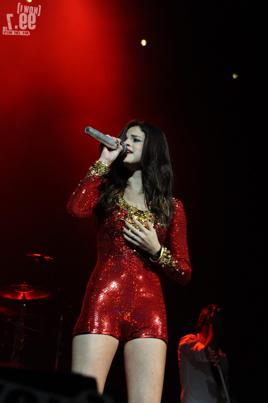 16P Selena Gomez in skimpy red outfit performing at the 99.7 Triple Ho Show in San J