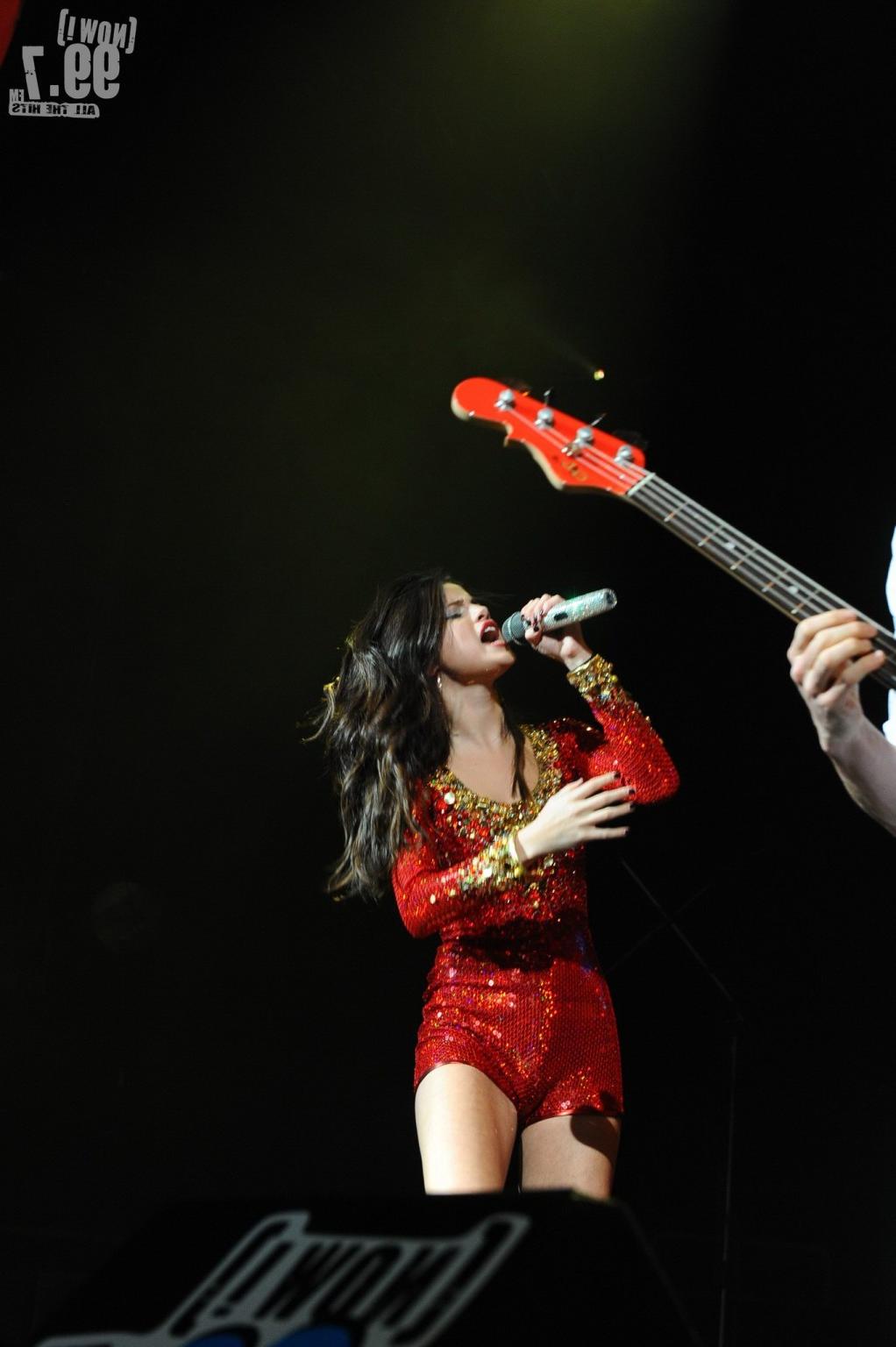 16P Selena Gomez in skimpy red outfit performing at the 99.7 Triple Ho Show in San J