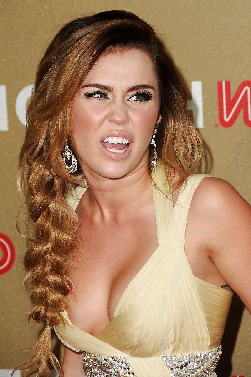 16P Miley Cyrus showing huge cleavage in long silk dress paparazzi pictures