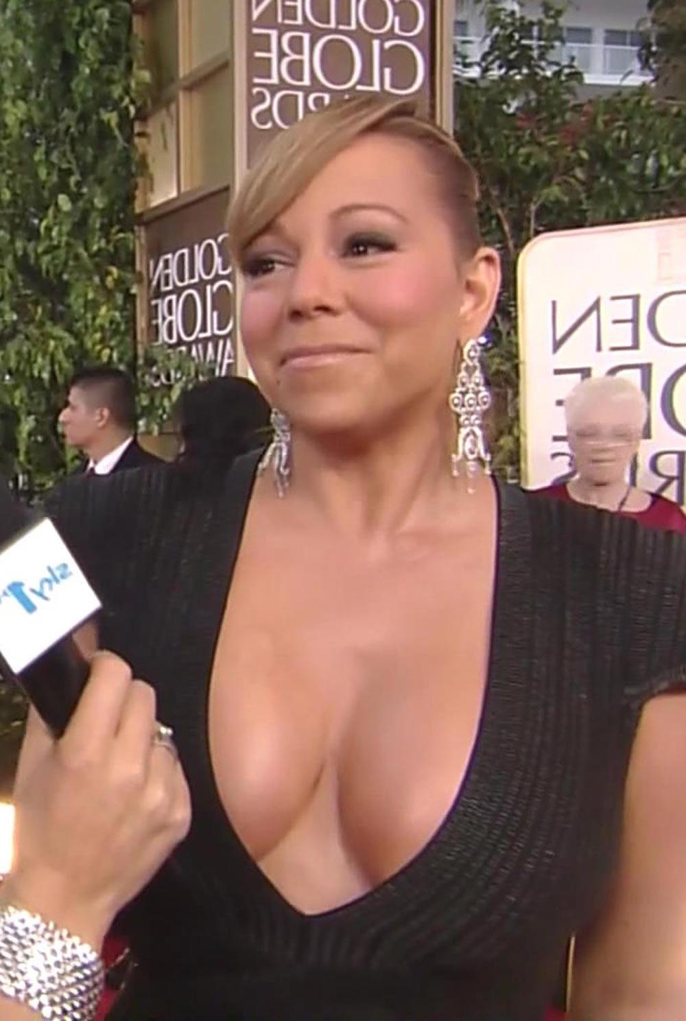 16P Mariah Carey massive big cleavage in black dress