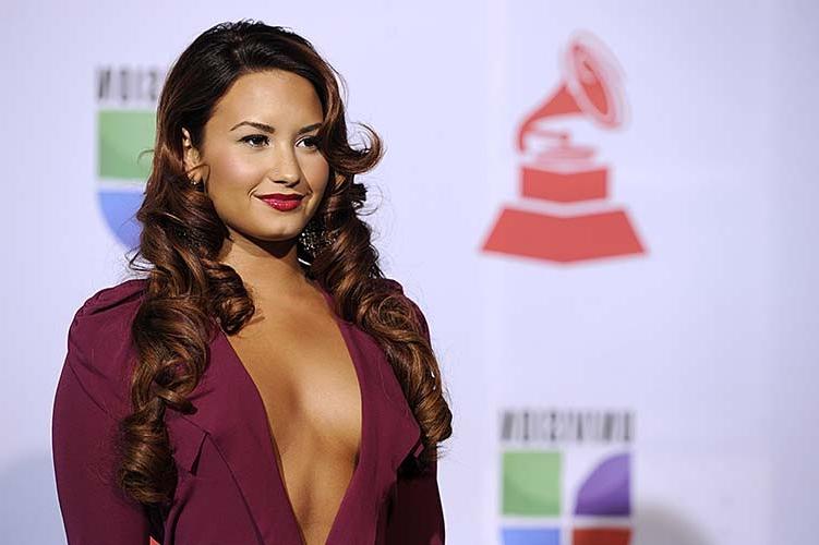 16P Demi Lovato exposing sexy body and huge cleavage in nice red dress