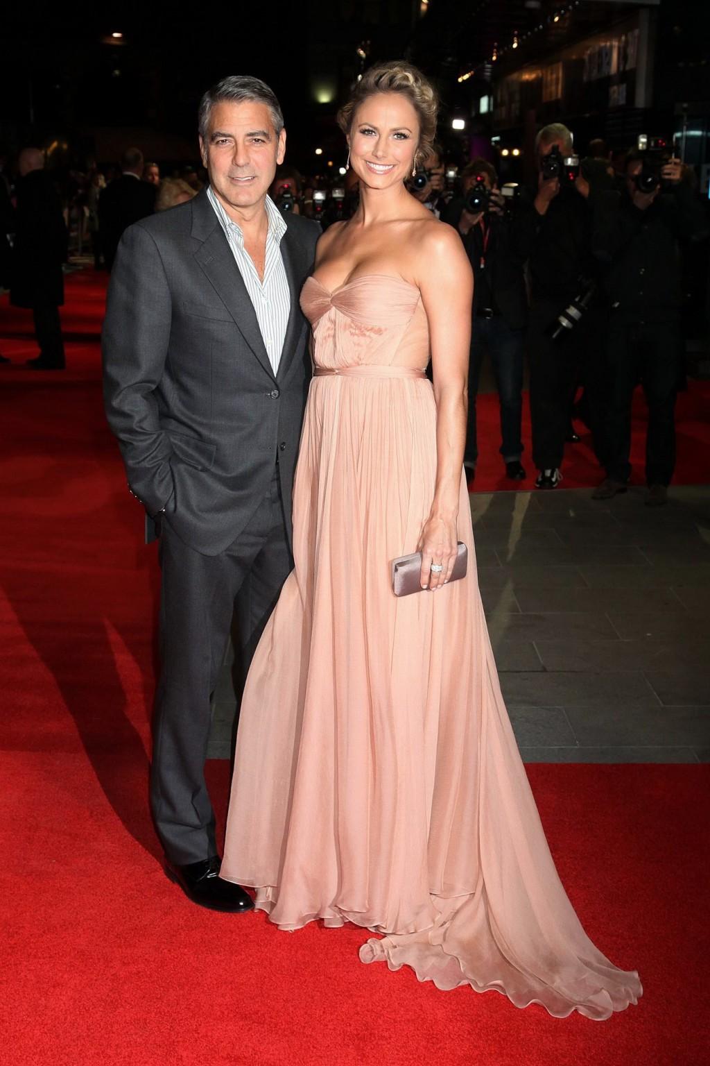 16P Stacy Keibler shows cleavage wearing a strapless maxy dress at 'The Descendants'
