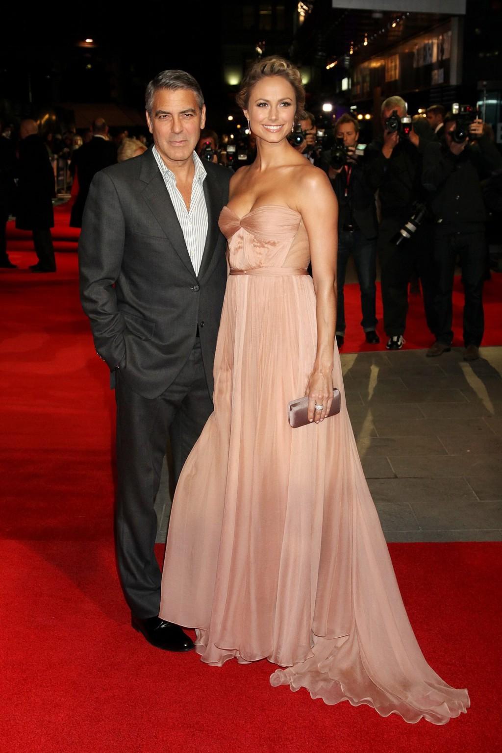 16P Stacy Keibler shows cleavage wearing a strapless maxy dress at 'The Descendants'