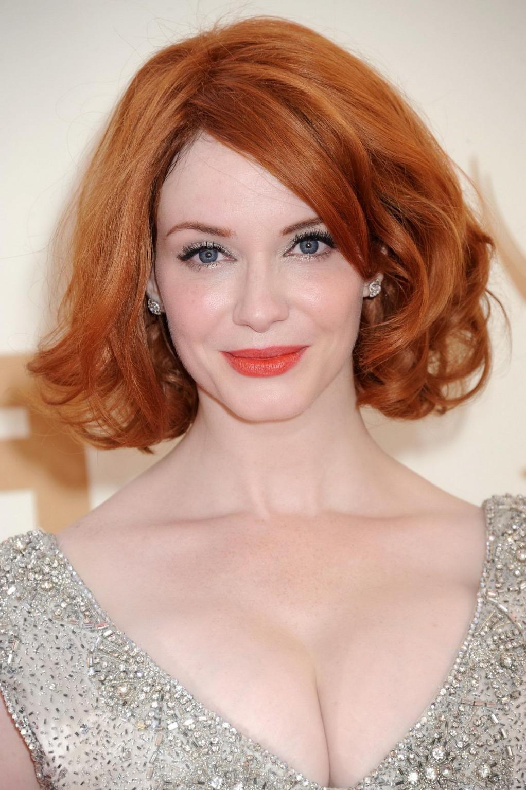 16P Christina Hendricks showing her enormous cleavage at 63rd Primetime Emmy Awards