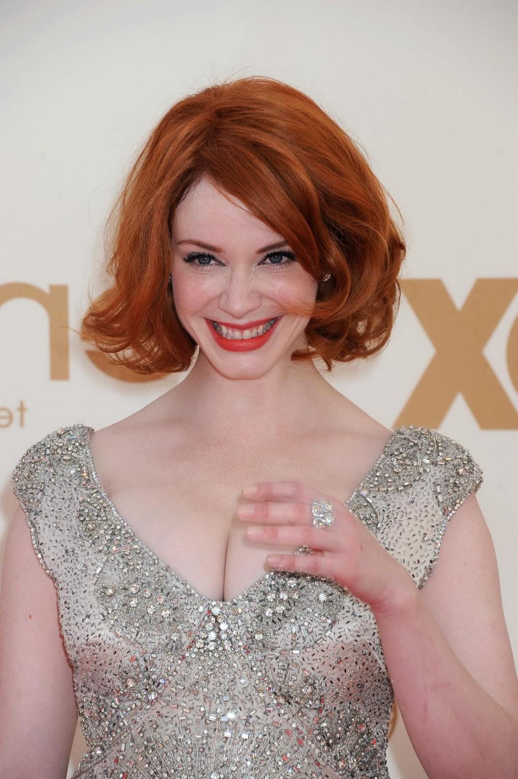 16P Christina Hendricks showing her enormous cleavage at 63rd Primetime Emmy Awards