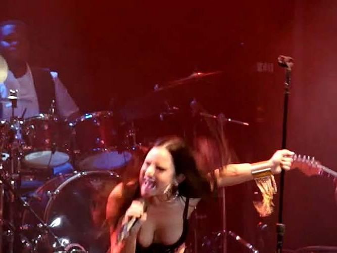 16P Joanna Jojo Levesque exposing her sexy body and nipple slip on stage