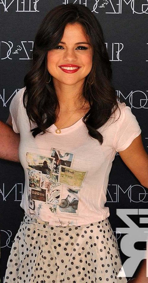 16P Selena Gomez looking very sexy and exposing her huge cleavage