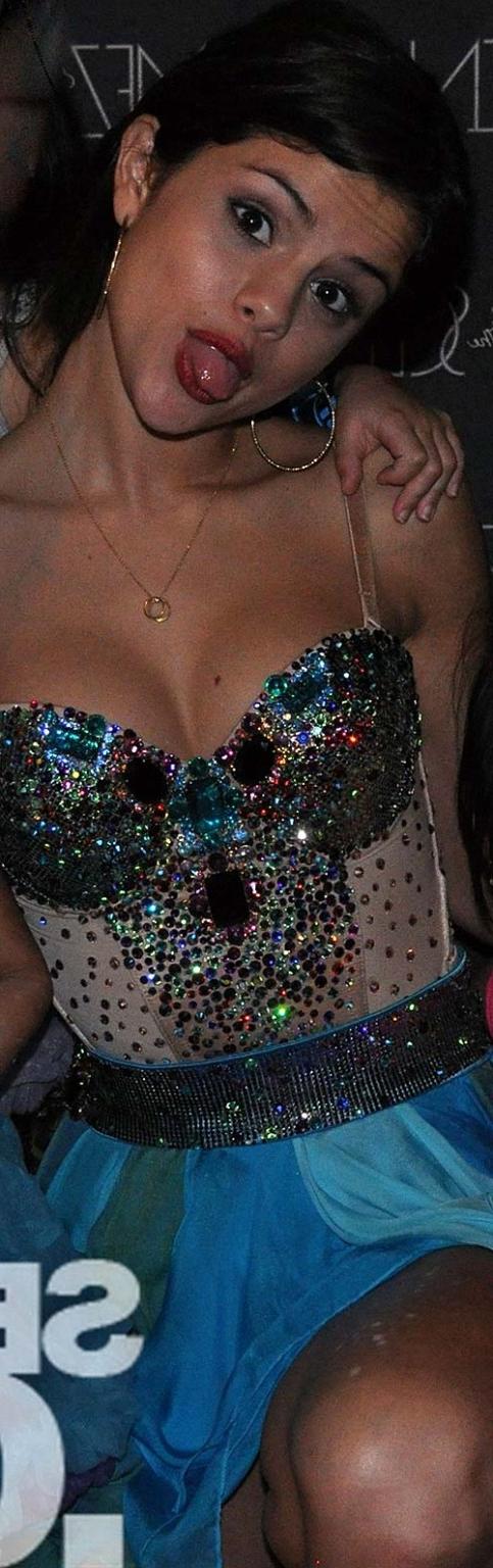16P Selena Gomez looking very sexy and exposing her huge cleavage