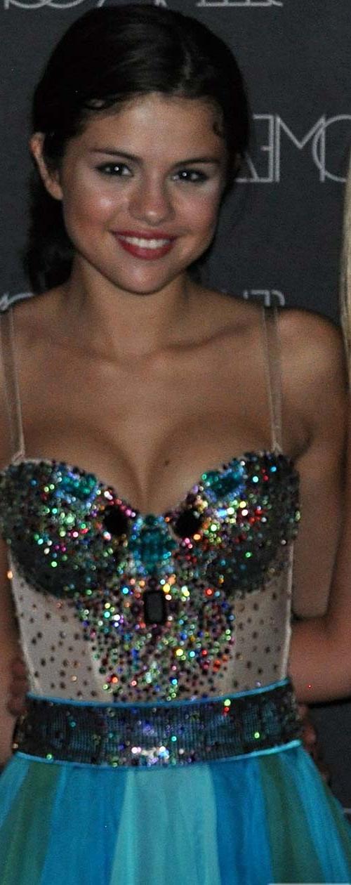 16P Selena Gomez looking very sexy and exposing her huge cleavage