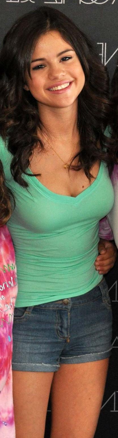 16P Selena Gomez looking very sexy and exposing her huge cleavage