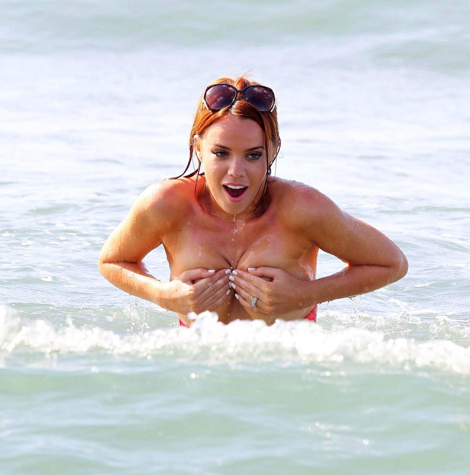 16P Maria Fowler boob slip wearing bikini on the beach in Marbella
