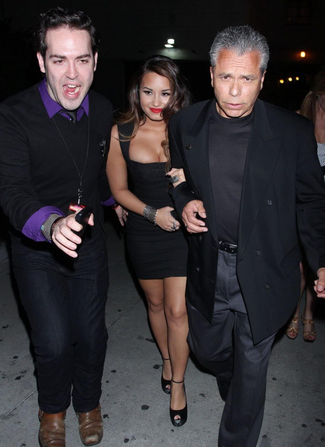 16P Demi Lovato shows huge cleavage in low cut black dress heading to MTV's VMA Pre 