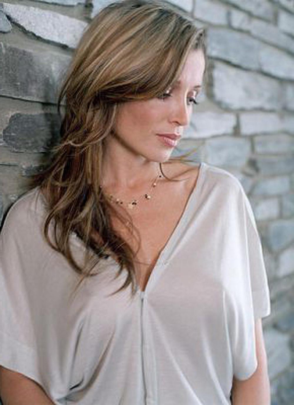 15P Dannii Minogue big cleavage in black bra