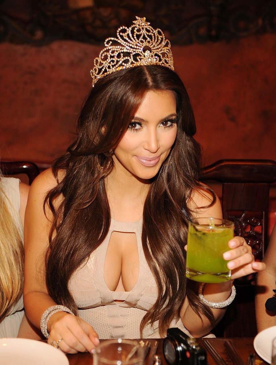 16P Kim Kardashian exposing sexy body and fucking huge cleavage