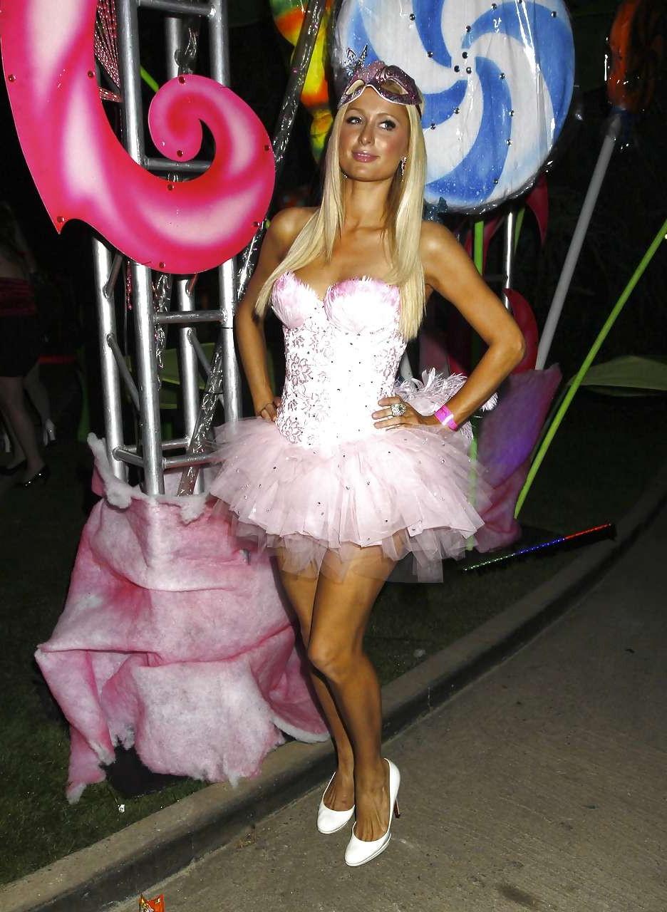16P Paris Hilton leggy and big cleavage in mini dress paparazzi pictures