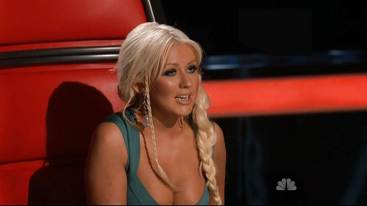 16P Christina Aguilera looking very busty and big cleavage in green dress