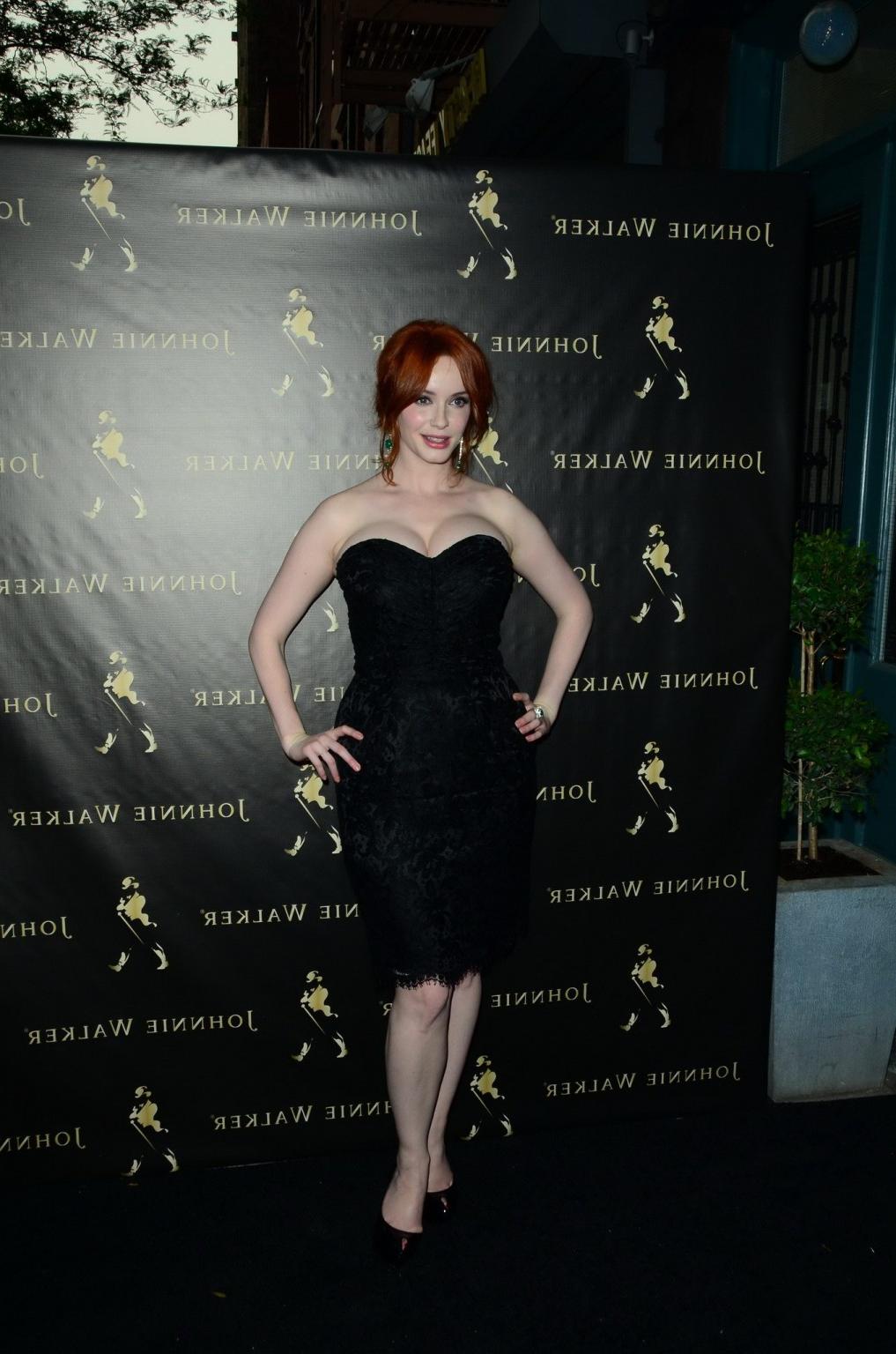16P Christina Hendricks showing enormous cleavage at Johnnie Walker Fathers Day Gift