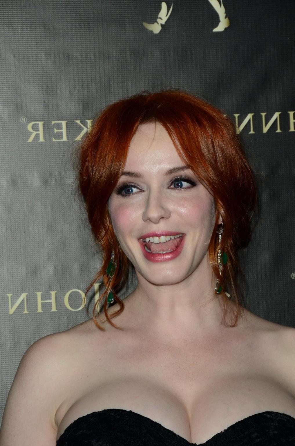 16P Christina Hendricks showing enormous cleavage at Johnnie Walker Fathers Day Gift