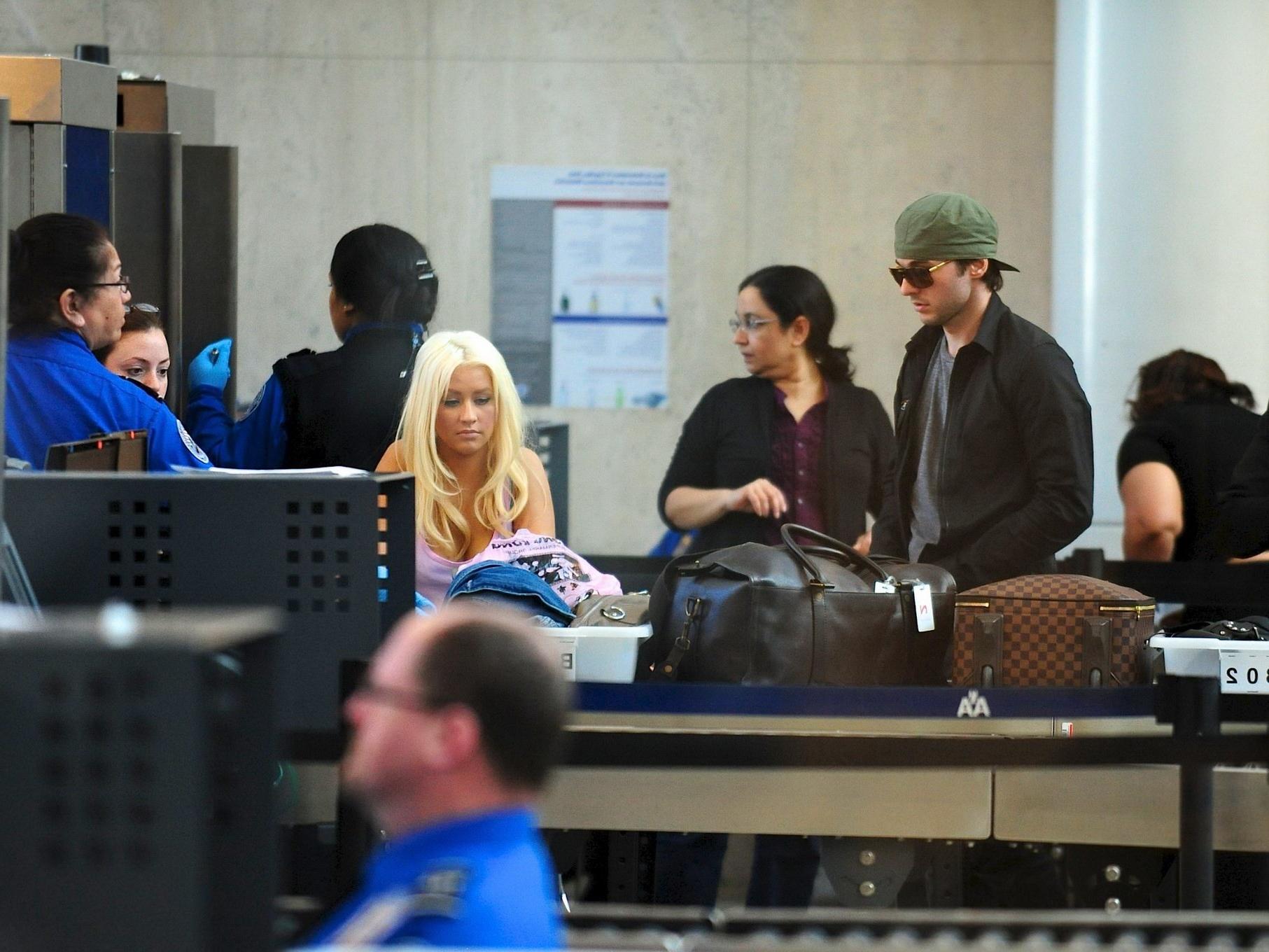 16P Christina Aguilera shows huge cleavage departing from LAX Airport