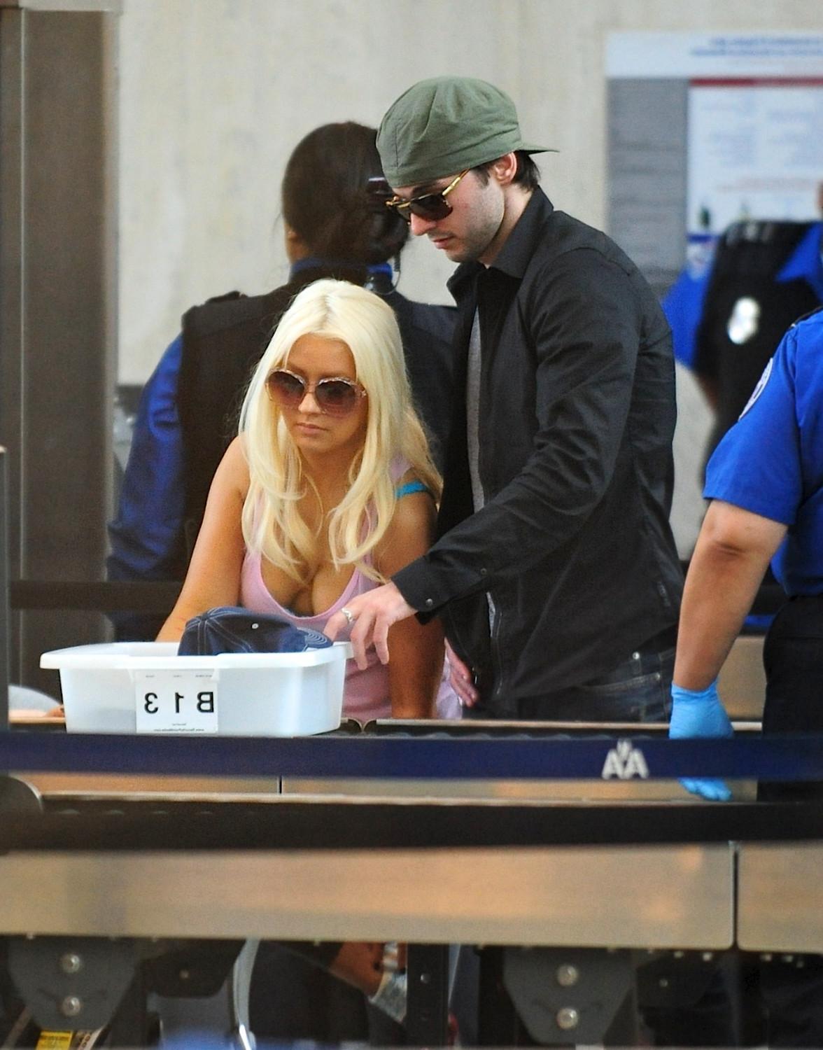 16P Christina Aguilera shows huge cleavage departing from LAX Airport