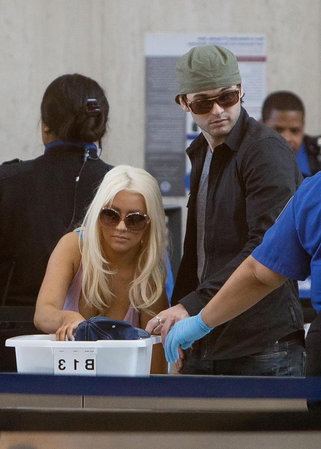 16P Christina Aguilera shows huge cleavage departing from LAX Airport