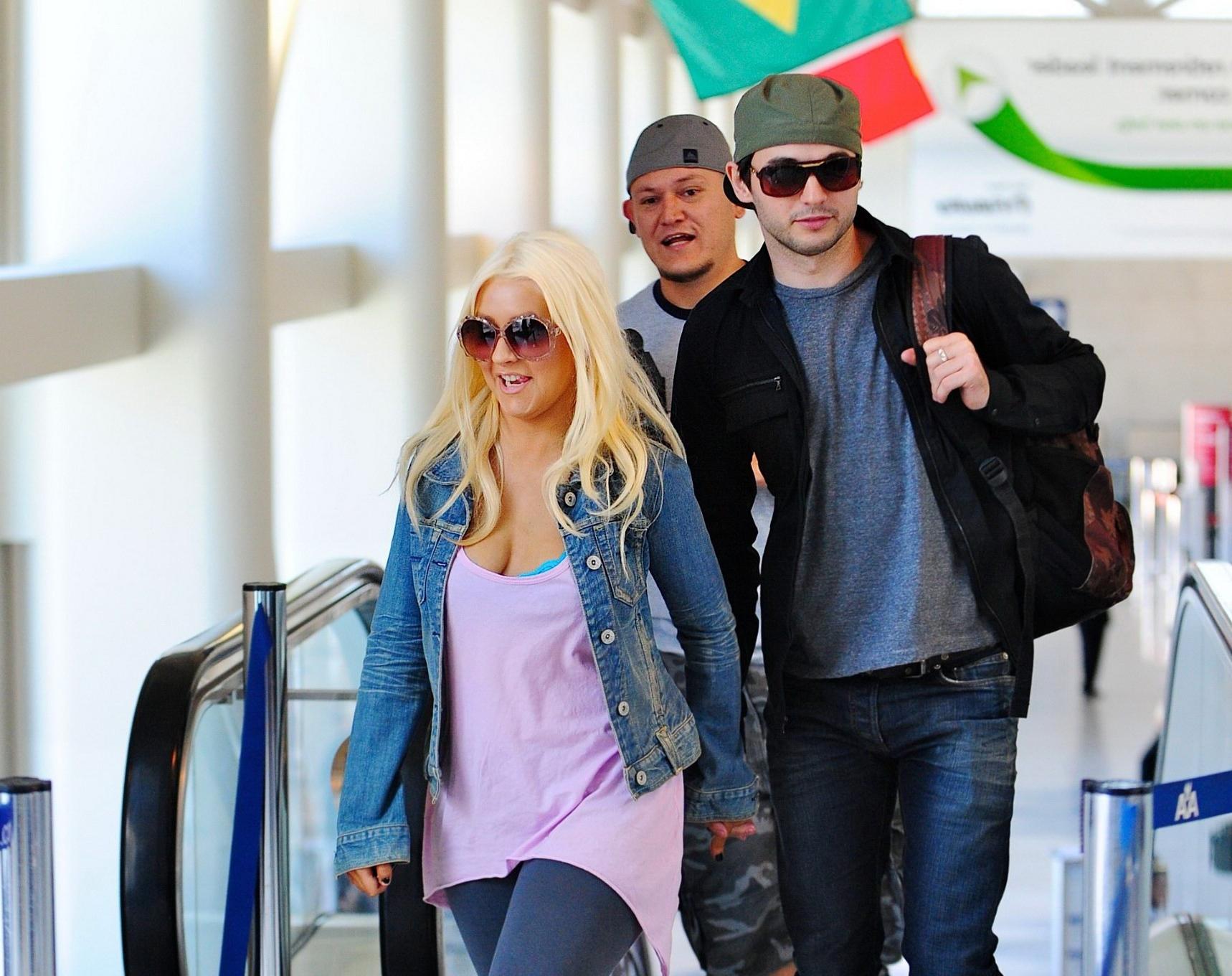 16P Christina Aguilera shows huge cleavage departing from LAX Airport
