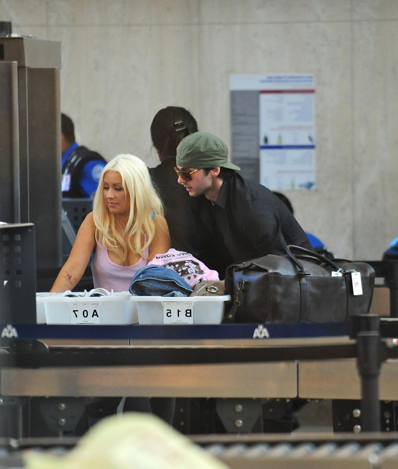 16P Christina Aguilera shows huge cleavage departing from LAX Airport