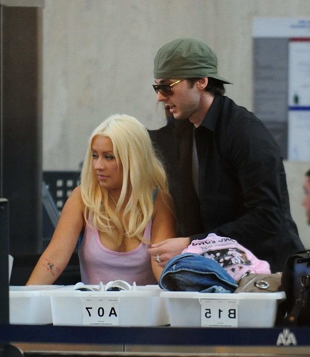 16P Christina Aguilera shows huge cleavage departing from LAX Airport