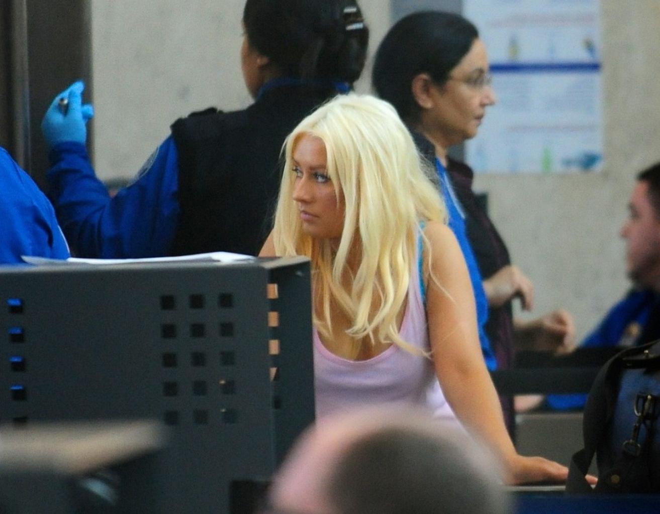 16P Christina Aguilera shows huge cleavage departing from LAX Airport