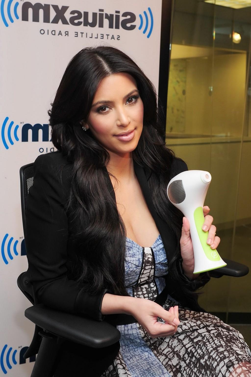 16P Kim Kardashian shows cleavage while guesting at SiriusXM Radio